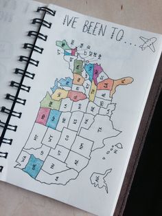 a notebook with a map drawn on it