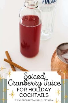 spiced cranberry juice for holiday cocktails with cinnamon sticks in the background