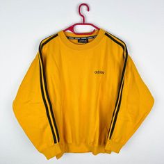 🚨 follow us on instagram @bestclassicvintage 🚨 Beautiful vintage Adidas sweater from the 90s. Very good used condition. Size approximately S Pit to Pit: 56 cm Back length: 62 cm Yellow Sporty Sweater For Streetwear, Sporty Yellow Sweater For Streetwear, Retro Yellow Sweatshirt For Winter, Vintage Sweater For Fall Streetwear, Vintage Fall Sweater For Streetwear, Vintage Crew Neck Winter Sweatshirt, Vintage Long Sleeve Sweater For Streetwear, Sporty Yellow Crew Neck Sweater, Retro Yellow Sweatshirt For Streetwear