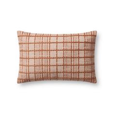 an orange and white plaid pillow on a white background