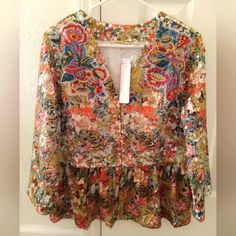 Multi Color Floral Top Or Coat. Brand New, Never Worn. By Designer Soft Surroundings Has Delicate Lace Like See-Through Burn Out Sleeves. Beading And Embroidery On Top Of Floral Print. Spring Multicolor Sequined Blouse, Multicolor Sequin Blouse For Spring, Fall Multicolor Embellished Tops, Multicolor Festive Tops For Fall, Fall Floral Print Blouse With Multicolor Embroidery, Spring Party Blouse With Multicolor Embroidery, Burn Out, Soft Surroundings, Floral Top