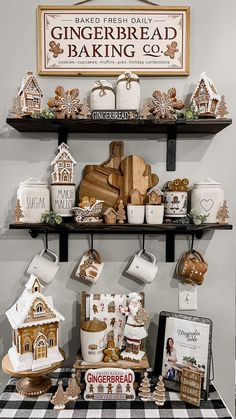 the gingerbread bakery display is decorated with gingerbread cookies and other holiday treats on shelves