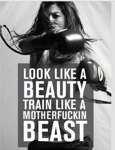 a woman with boxing gloves on her head and the words look like a beauty train like a motherfuckin beast