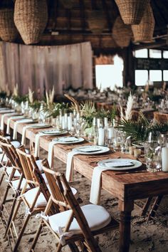 a long table set up with place settings