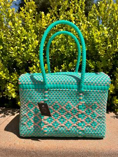 🌵Unique handwoven eco-friendly bag made with repurposed plastic. Perfect multi-use bag for any occasion.Handcrafted with great care by Mexican Artisans. 🌵Small Tote Approx. Dimensions  Length 12" | Height: 8" | Width 6" | Handle:10"  Magnetic closure  Easy Clean Wipe Down  Washable and Air Dry  Resistant  *All woven products may vary slightly in size and pattern due to the nature of being handmade* ️If you have any questions, please feel free to contact us. We are happy to help 😊 Reusable Rectangular Beach Bag For Shopping, Green Woven Square Straw Bag, Green Recycled Materials Bag For Daily Use, Green Woven Beach Bag For Travel, Green Rectangular Woven Straw Bag, Eco-friendly Green Straw Shopping Bag, Rectangular Green Woven Straw Bag, Green Handwoven Square Straw Bag, Eco-friendly Rectangular Beach Bag