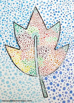 a drawing of a colorful leaf on a blue and white background with watercolor dots