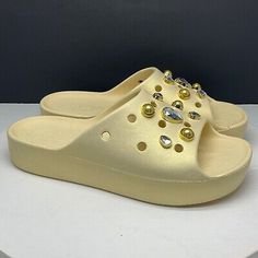 Crocs Sandals Womens 11 Classic Platform Slide Crystals Pearls Vanilla 208388  | eBay Gold Synthetic Slides For Beach, Gold Synthetic Slides For Vacation, Casual Gold Synthetic Slides, Gold Flat Slides For Summer, Gold Flat Slides For Beach, Gold Round Toe Slides For Beach, Trendy Gold Slides For The Beach, Trendy Gold Open Toe Slides, Gold Synthetic Slides