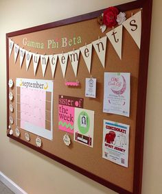 the bulletin board is decorated with papers and magnets