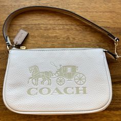 Small White Leather Coach Bag In Perfect Condition Coach Cream Clutch Bag, Coach White Pouch Shoulder Bag, White Coach Pouch Shoulder Bag, Classic White Pouch Shoulder Bag, White Shoulder Clutch Bag, White Coach Pouch Bag, White Clutch Bag, Coach Nolita 19, Coach Nolita