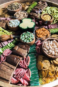 a platter filled with lots of different types of food