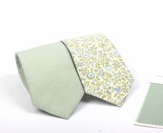 This tie/bow tie  is a Wedding Favorite ~it  is perfect for weddings or special occasions. Fabric: linen / cotton floral  Fabric Care: Dry-clean Only The default  ribbon of bow tie is white ribbon and the default color of suspenders is brown . If you want other colors, please remark in the note when you place order.   Return Policy: If you are unhappy with your item, be it damage, defect or otherwise, we will happily accept a return/exchange.  Returns must be unworn, unwashed, undamaged, and una Green Suit And Tie Accessories For Spring Wedding, Green Wedding Suit And Tie Accessories For Spring, Green Tie For Wedding On Father's Day, Green Summer Wedding Tie, Green Summer Ties For Groom, Green Adjustable Tie For Groom, Sage Green Floral Ties Groomsmen, Sage Floral Tie, Floral Tie Groom