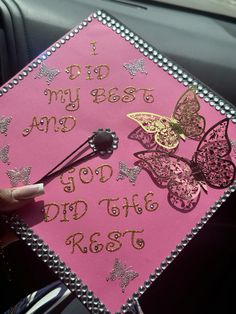 a pink and gold graduation cap with butterflies on the side that says, i did my best and god did the rest