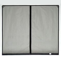 a black and white room divider with two panels on the top, one side open