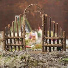 two wooden chairs made out of sticks and grass