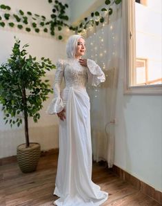 ✨ Elevate your evening look with our stunning Hijab Soiree Dress! This elegant gown features exquisite detailing, perfect for making a statement at any formal event. With its modest design and luxurious fabric, you'll feel both comfortable and glamorous. 🌟  💫 Ideal for weddings, galas, and special occasions, our Hijab Soiree Dress combines timeless style with modern elegance. Available in a range of sizes and colors to suit every taste.  🛍️ Shop now and discover the perfect dress for your next soirée!  #HijabFashion #EveningGown #ModestFashion #HijabDress #FormalWear #EveningWear #ModestEveningDress #ElegantFashion #MuslimahStyle #ModestGlamour #SpecialOccasionDress #FormalDress Bride Dress Hijab, Hijabi Wedding Dress Simple, Soiree Dresses For Hijab Classy, Hijabi Engagement Dress, Hijabi Dresses Soiree, Sequin Long Gown, Soiree Dresses For Hijab, Hampers Hijab, Simple Engagement Dress