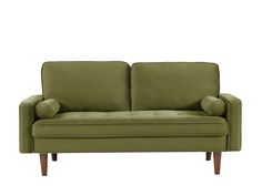 a green couch sitting on top of a wooden frame