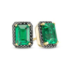 Curate your collection of classic accessories with these unforgettable stud earrings. Crafted in warm 10K gold, each refined earring showcases a 7.0 x 5.0mm emerald-cut lab-created verdant-green emerald wrapped in a frame of alluring black diamonds. Radiant with 1/4 ct. t.w. of diamonds and a brilliant buffed luster, these post earring secure comfortably with friction backs. Classic Formal Emerald Earrings, Classic Emerald Earrings For Formal Occasions, Classic Emerald Jewelry For Evening, Classic Evening Emerald Jewelry, Classic Green Diamond Cut Earrings, Classic Emerald Earrings For Anniversary, Classic 14k Gold Gemstone Earrings, Classic Gold Emerald Cut Earrings, Classic Emerald Diamond Earrings