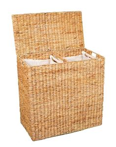 a wicker storage basket with two bins on the bottom and one in the middle