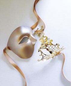 Embark on a night of elegance and allure with our exquisite couples Venetian masquerade masks in Gold – a perfect fusion of sophistication and mystery! With the iconic Phantom of the Opera style for the men's mask and dazzling rhinestones on the women's mask, this set will make you the stars of any masquerade party, ball, gala, or any other special event!


Age Group/Gender - Adult/Unisex

Size/Type - One size fits all adults

Mask Color - Gold

Mask Material - Metal women's, plastic men's

Acce Masquerade Ball Gowns Elegant With Mask, Fantasy Masquerade, Phantom Masquerade, Masquerade Aesthetic, Phantom Mask, Couples Masquerade Masks, Masquerade Ball Masks, Gold Masquerade Mask, Masquerade Outfit