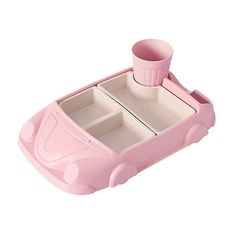 a pink toy car with two cups in it