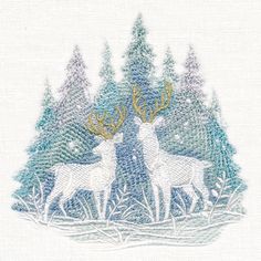 two white deer standing next to each other in front of trees and snow covered ground