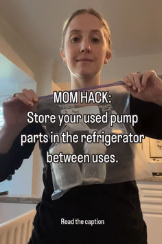 a woman holding up an empty bottle with the caption mom hack store your used pump parts in the refrigerator between uses