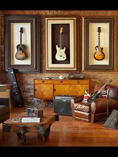 a living room with guitars on the wall and music memorabilia in front of it that reads, no music no life know music know life