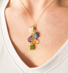 Multi gemstone mothers day gift charm necklace for beautiful mom jewelry. Beautiful rough cut gemstones in 12 different color options - choose up to 9 gemstones. 100% Sterling Silver, 14K Gold/Rose Gold Filled Materials for Quality Keepsake Jewelry. More Mom Necklaces: https://www.etsy.com/shop/ivybydesign?search_query=mom Handmade in our shop and packaged with care in an IvyByDesign gift box (see last photo). SHIPS in 1 Business Day! RETURN POLICY / SATISFACTION GUARANTEE Our #1 Priority at Ivy May Birthstone Natural Gemstones As Gift, May Birthstone Gemstones As Natural Gift, Natural Gemstones For May Birthstone Gift, May Birthstone Natural Stones Gemstones As Gift, Gift Charm Necklaces With Dangle Natural Stones, Pendant Birthstone Necklace With Gemstone For Mom, Birthstone Pendant Necklace For Mom, Birthstone Gemstone Pendant Necklace As Gift For Mom, Gemstone Birthstone Pendant Necklace As Gift For Mom