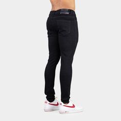 ✓ Versatile Men's Skinny Fit - A perfectly fitted look from waist to ankle with no saggy areas on slim guys, with stretch to accommodate men with larger muscular thighs, glutes and calf muscles. ✓ Ultra-Stretch Denim - Luxurious denim elastane blend to give a flexible waist and leg fit, plus full freedom to move with comfort qualities more like activewear. ✓ Stylish Jeans - Understated design, with a satisfying real denim weight, for a classy modern look in classic Jet Black. ❌ Not for guys who Streetwear High Rise Slim Fit Bottoms, High Rise Slim Fit Jeans For Streetwear, High Rise Slim Fit Bottoms For Streetwear, Black Slim Stretch Bottoms, Fitted Tapered Leg Streetwear Bottoms, Black Slim Fitted Jeans, Fitted Tapered Leg Bottoms For Streetwear, Sporty High Rise Fitted Jeans, Sporty Fitted Mid-rise Jeans