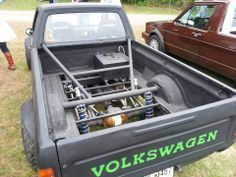 the back end of a pick up truck with an engine in it's bed