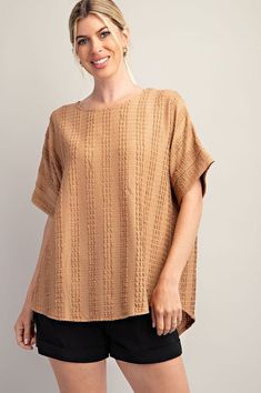 Textured Round Neck Dolman Sleeve Top 95% Polyester 5% Spandex Textured Tops For Fall, Textured Crew Neck Tops For Fall, Versatile Spring Tops With Batwing Sleeves, Versatile Batwing Sleeve Tops For Spring, Spring Versatile Batwing Sleeve Top, Casual Solid Color Textured Tops, Casual Textured Tops For Fall, Textured Relaxed Fit Crew Neck Top, Relaxed Fit Textured Crew Neck Top