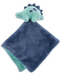 a blue towel with a green dinosaur on it