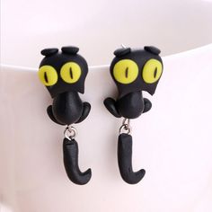 Stud Earrings-Cartoon 3D Animal Earrings For Women 1 pair New Design Handmade yellow eyes Cute Cat Stud Earring Fashion Jewelry Polymer ClayModel Number:32837102488 It is a good gift for your lover,family,friend and coworkers Make you charmer and elegant Beautiful and attractive A good choice in your daily life. Description: Material: polymer clay/Alloy Color:Black (with yellow eyes) Size: about 4.0*1.5c m(1inch=2.54cm) Making: Handmade Package includes:1 pair x earrings Gatto Carino, Cat Earrings Studs, Cartoon 3d, Earrings Clay, Polymer Clay Animals, Clay Animals, Alloy Earrings, Animal Earrings, Stud Jewelry