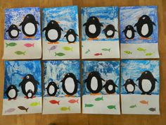 penguins and fish are depicted in this art project