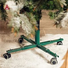 Make sure that your decorations are perfect this holiday season Key Product Features Wheels lock for extra stability Adjustable legs can be moved out for stability with taller trees Wheels move 360 degrees for better movement Easy to assemble Our rolling Christmas tree stand on wheels is a great choice for offices and shops. You can easily move your tree around the room to get a different angle, but it's also great for anyone who needs to clean around it. The green coating looks great under the green of your tree. Made to support artificial trees only! Artificial Christmas Tree Stand, Christmas Tree Holder, Christmas Tree Base, Dog Pooper Scooper, Fake Trees, Tree Collar, Tree Base, Real Christmas Tree, Christmas Tree Stand