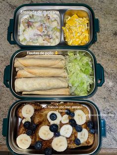 two plastic containers filled with food on top of a table