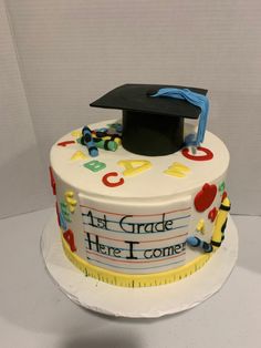 a cake with a graduation cap on top