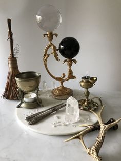 a table topped with lots of different types of items on top of a white counter