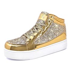 PRICES MAY VARY. Women's high-top glitter sneakers adorned in a radiant golden hue, exuding opulence and glamour. The thoughtfully designed platform heels offers a harmonious balance of comfort and style, allowing you to strut with confidence. Whether you're hitting the dance floor at a disco-themed party or walking down the aisle at a wedding, these shoes are a show-stopping choice. An irresistible gift for any occasion: sparkling sneakers perfect for her to wear during Valentine's Day, Christm Sparkly Sneakers, Shiny Fashion, Disco Wedding, Sparkly Shoes, Metallic Sneakers, Glitter Sneakers, Golden Glitter, Glitter Shoes, Black High Tops