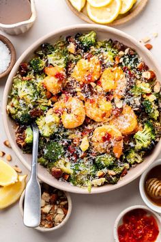 a bowl filled with broccoli and other foods