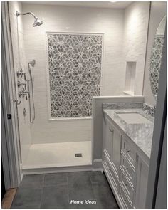 a bathroom with two sinks and a bathtub next to a walk - in shower