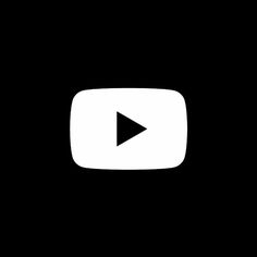 a black and white photo of a video player's play button in the dark