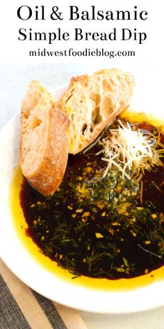 oil and balsamic simple bread dip in a bowl with bread on the side