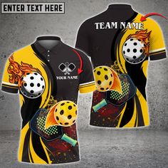 a yellow and black soccer jersey with an image of a ball on the back, in front of a concrete background