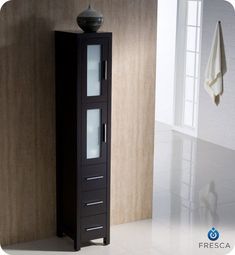 a tall wooden cabinet sitting next to a window