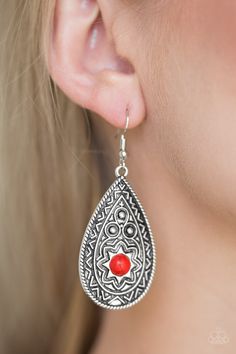 A fiery red stone bead is pressed into an ornate silver teardrop radiating with sunburst details for a seasonal look. Earring attaches to a standard fishhook fitting.

 Sold as one pair of earrings. Red Stone Earrings, Rose Gold Frame, Twisted Metal, Fish Hook Earrings, Fiery Red, Paparazzi Accessories, Red Earrings, Blue Gems, White Rhinestone