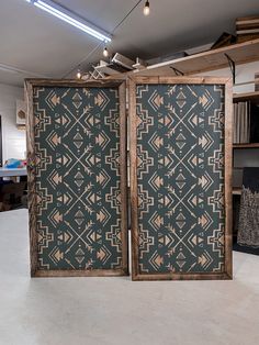 an open room divider in front of a bookshelf