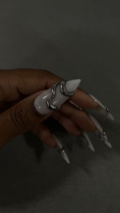 Milky white nails with silver 3D chrome design