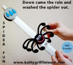 a spider puppet is being held by someone's hand with the caption down came the rain and washed the spider out