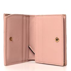 This is an authentic GUCCI Calfskin Matelasse GG Marmont Card Case Wallet in Perfect Pink. This stylish cardholder is crafted of chevron calfskin leather in pink. The wallet features an aged gold GG on front. This wallet opens to a pink leather interior with card slots, zipper pocket, and a bill compartment. Card Case Wallet, Gg Marmont, Perfect Pink, Gucci Wallet, Pink Leather, Leather Interior, Card Case, Card Slots, Zipper Pocket